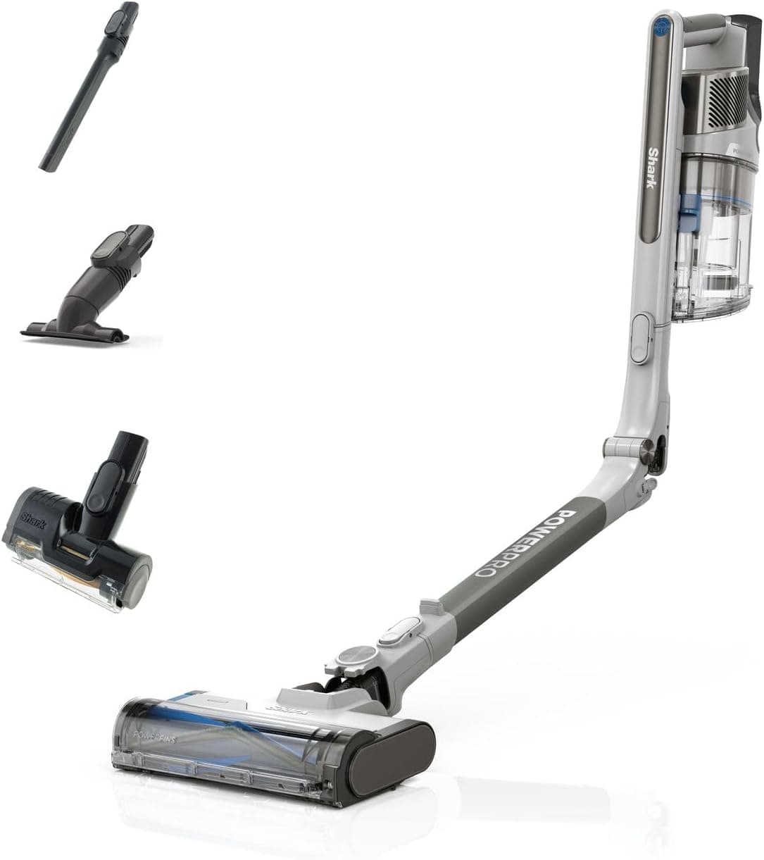 A grey Shark cordless stick vacuum with its wand bent at the middle, shown with its three handheld tools