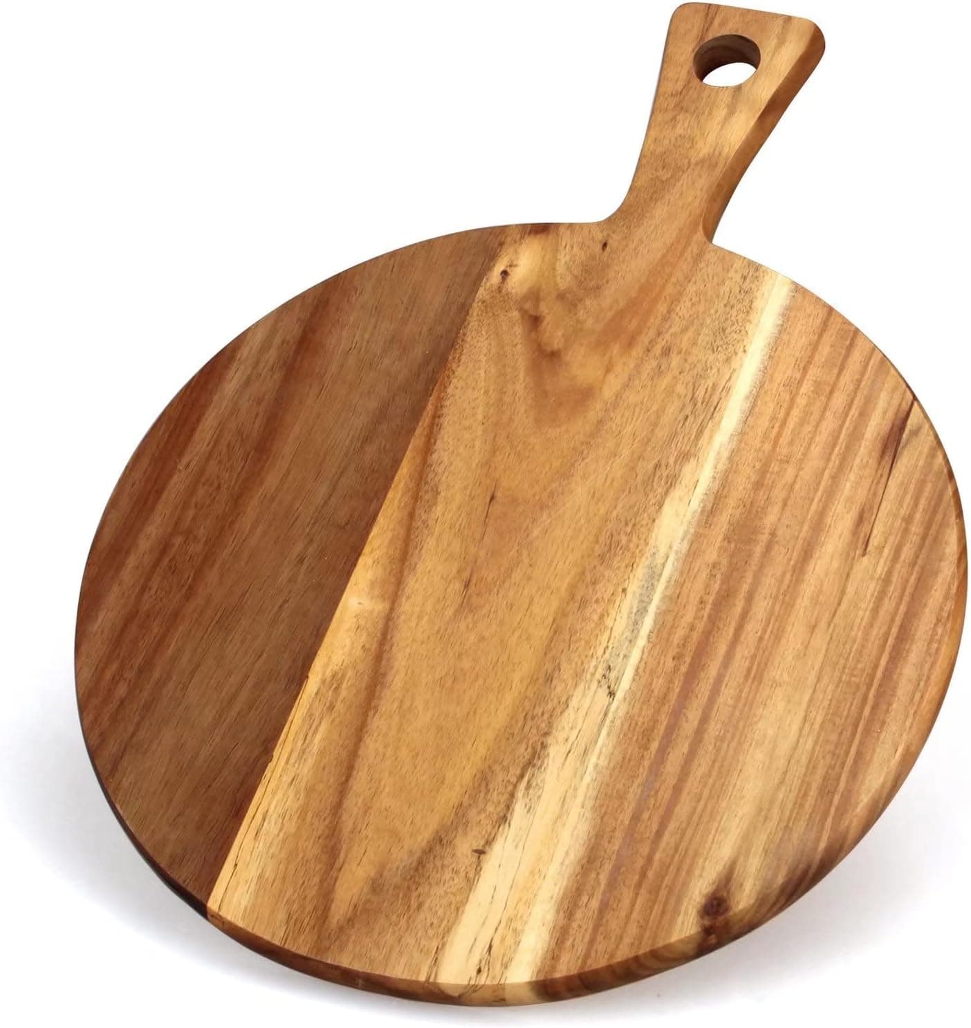 A round acacia wood serving board with a short handle and a hanging hole, its grain running across the face
