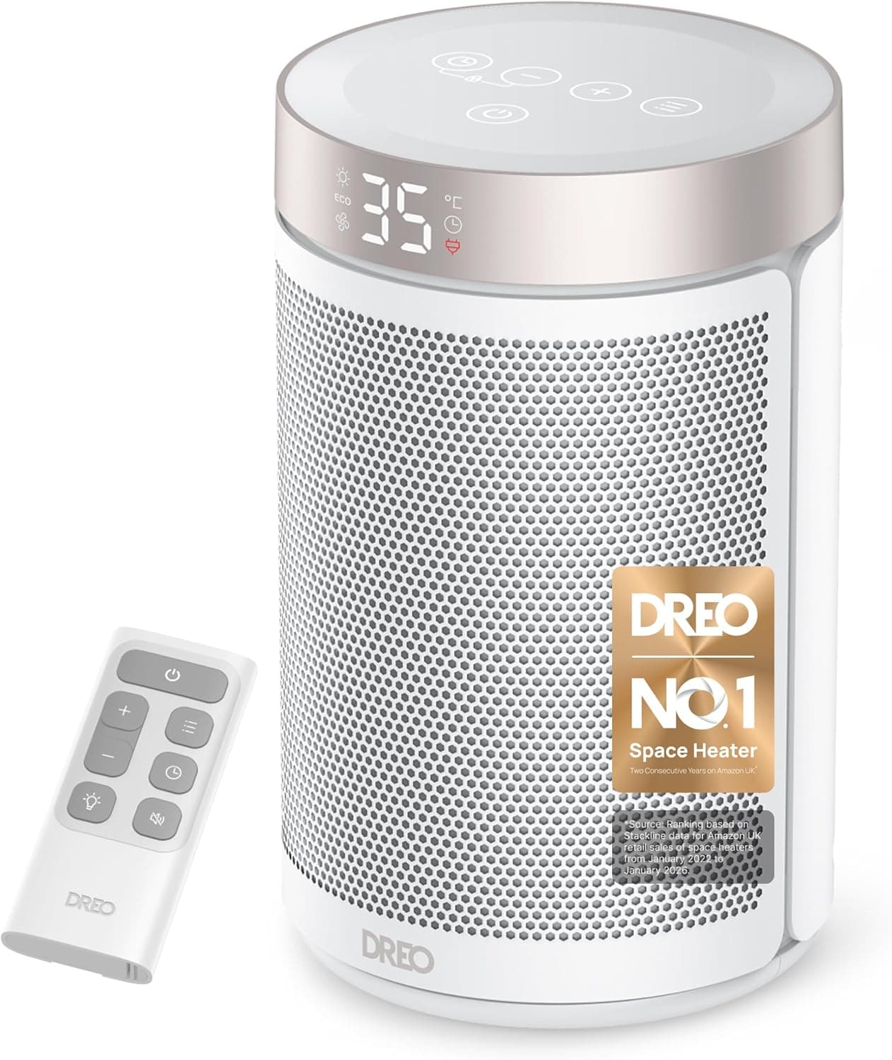 A small white Dreo ceramic fan heater with a digital display on a wooden floor beside a desk chair