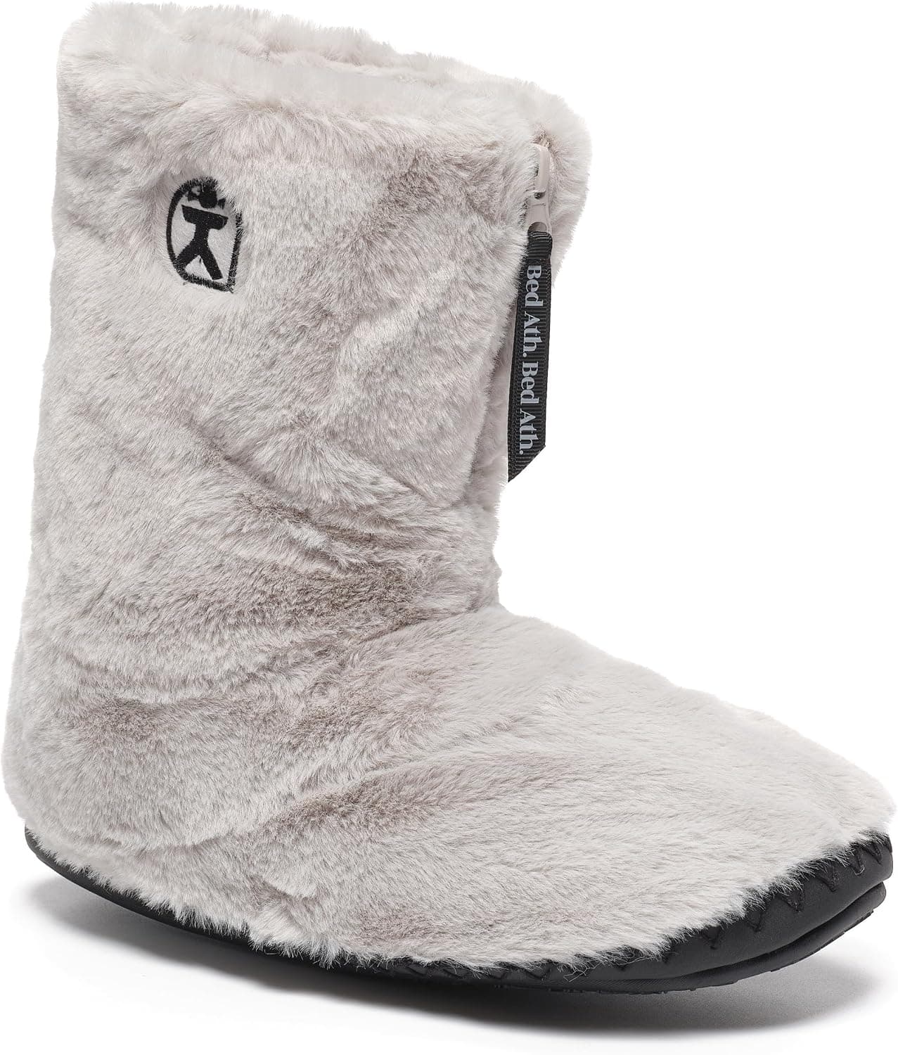 A light grey faux fur slipper boot with a side zip and a dark non-slip sole