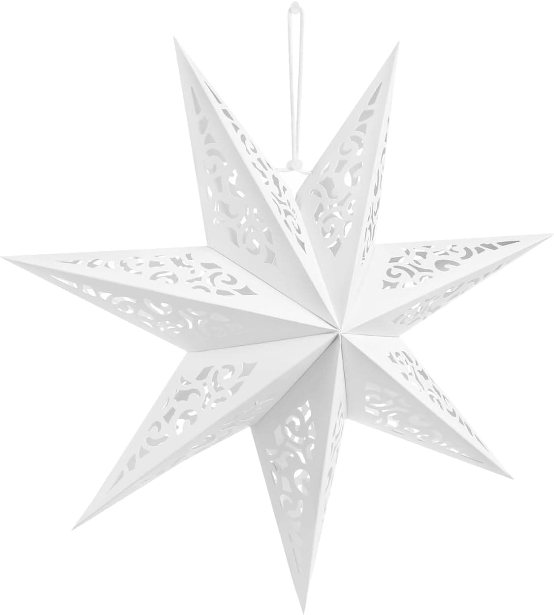 A white seven-pointed paper star with cut-out scrollwork on each point, hanging from a white loop