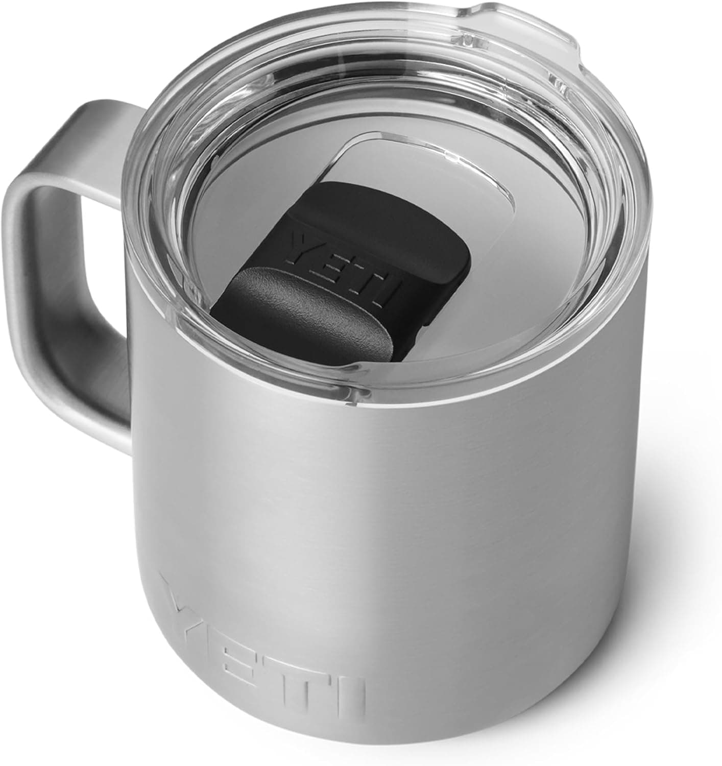 A brushed stainless steel YETI mug with a squared handle and a clear lid with a black sliding magnetic tab