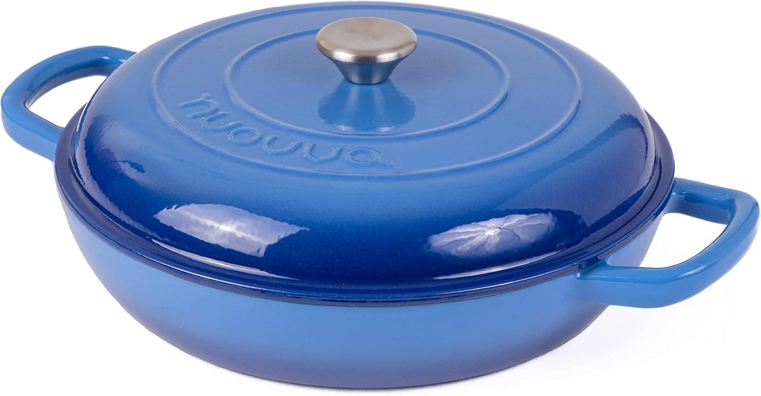 A wide, shallow blue enamelled cast iron casserole dish with two handles and a matching lid