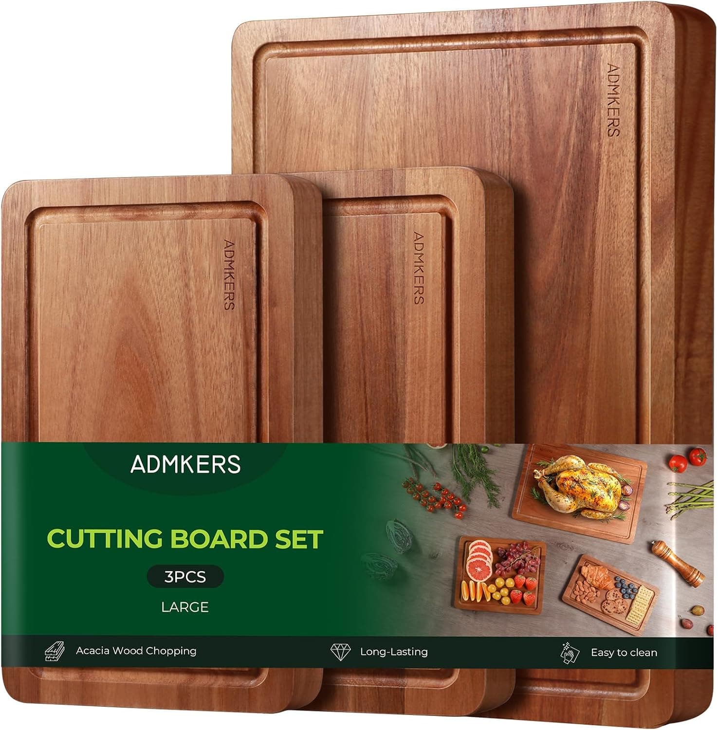 Three rectangular acacia wood chopping boards in graduated sizes, with juice grooves and a warm striped grain