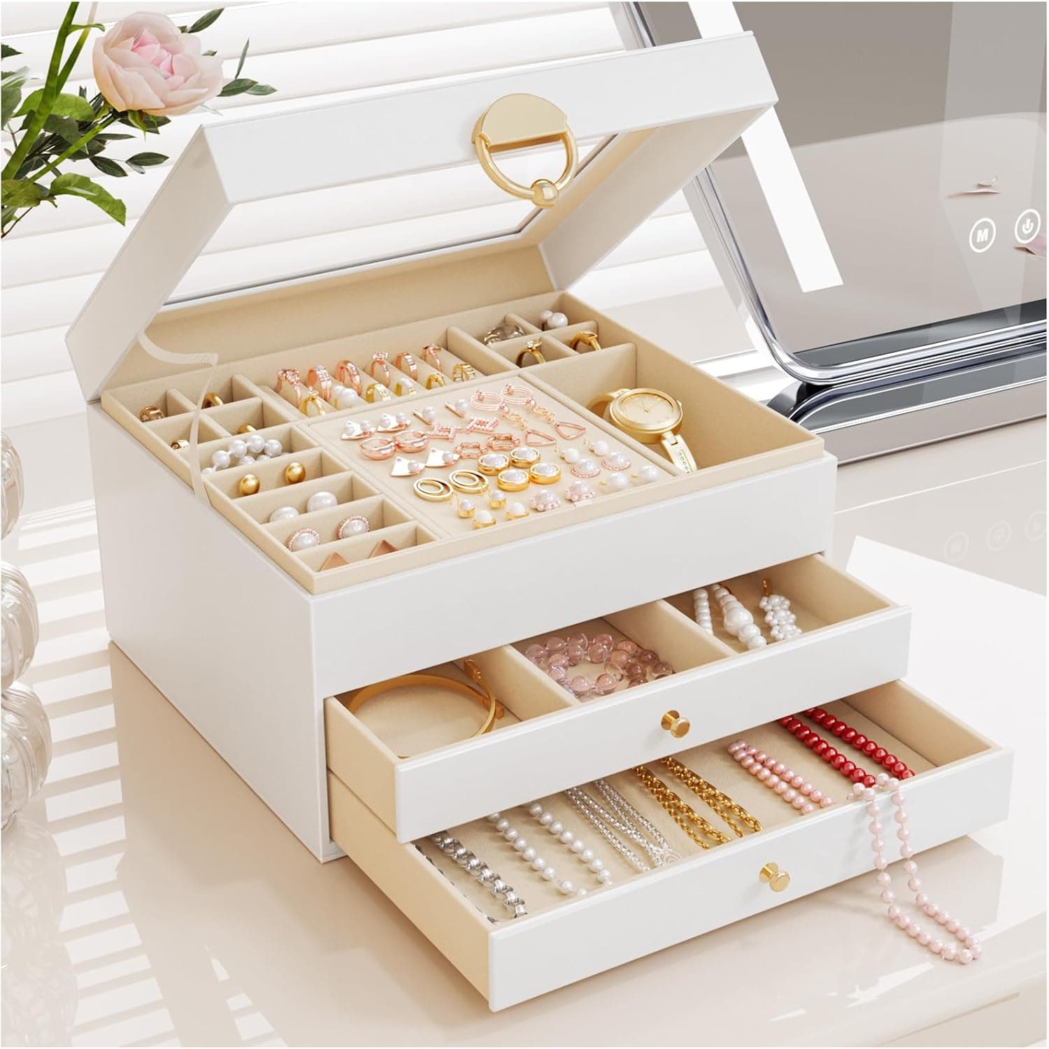 A small white matte jewellery box with a clear lid, a lift-out top tier and two drawers, lined in velvet